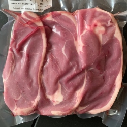 A pack of lamb chump steaks from Red Down Beef and Lamb on a black background.