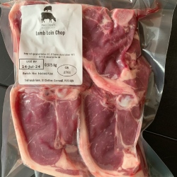 A pack of lamb loin chops from Red Down Beef and Lamb on a black background.