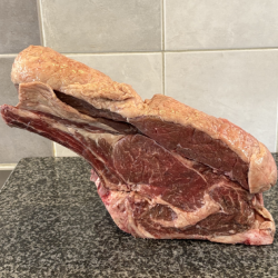 Image of a joint of bone-in rib of grass-fed beef